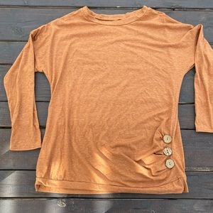 Orang long sleeve top with wooden button accent